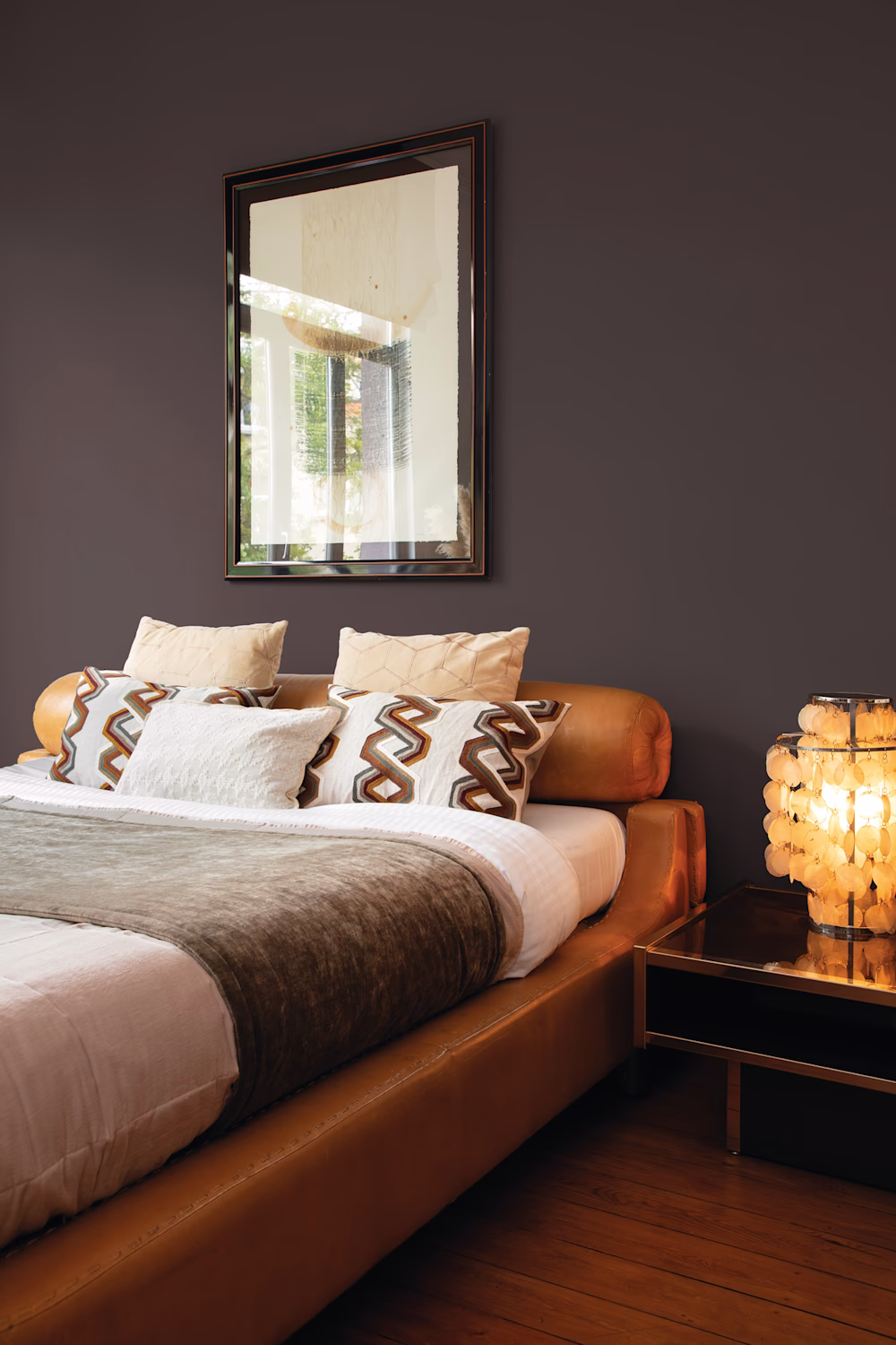 Welke kleur moet ik de muur achter een bed geven?