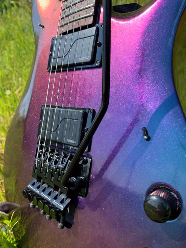 Kun je gitaar spelen met acrylverf?