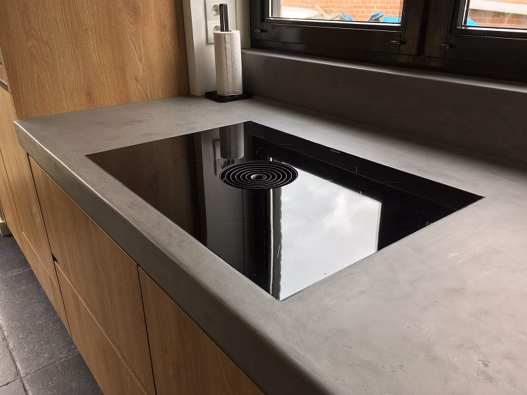 Kan ik beton ciré op een bestaand aanrechtblad aanbrengen?