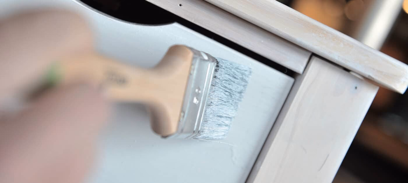 Hoe verwijder ik harde wasolie van kwasten?