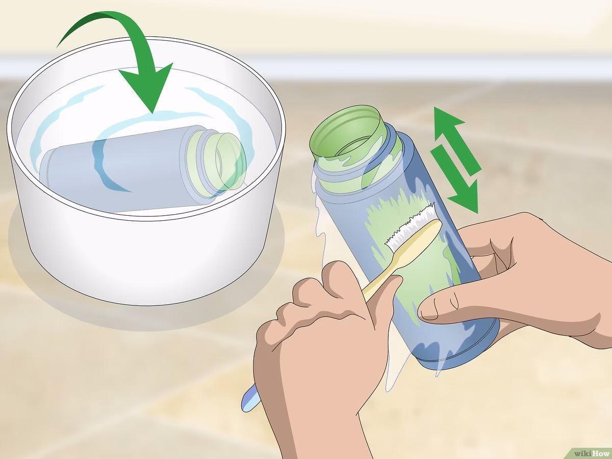 Hoe verwijder ik verf van een kunststof buis?