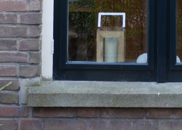 Hoe schilder ik een stenen vensterbank buiten?