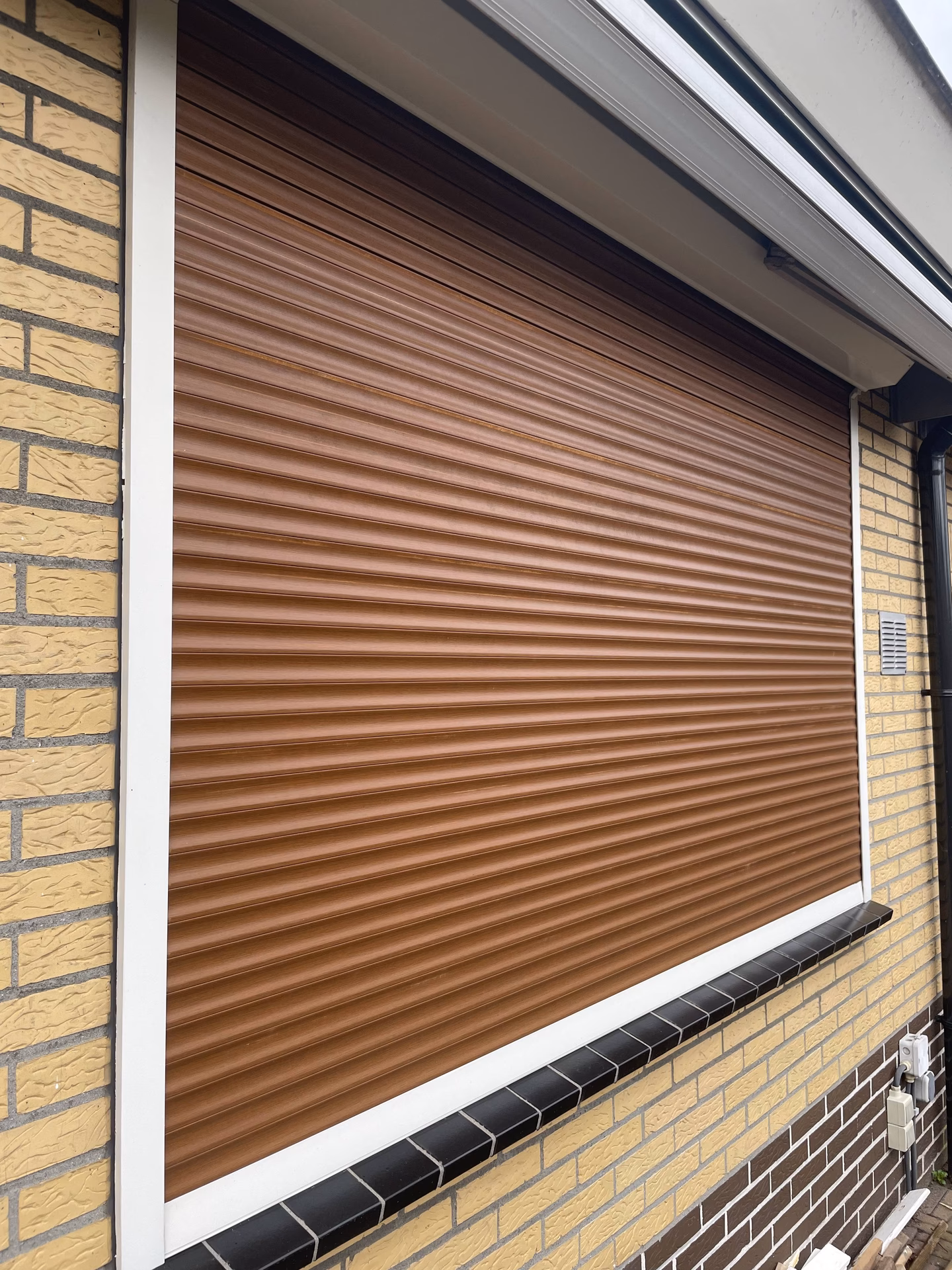 Welke kleur rolluiken helpt tegen warmte?