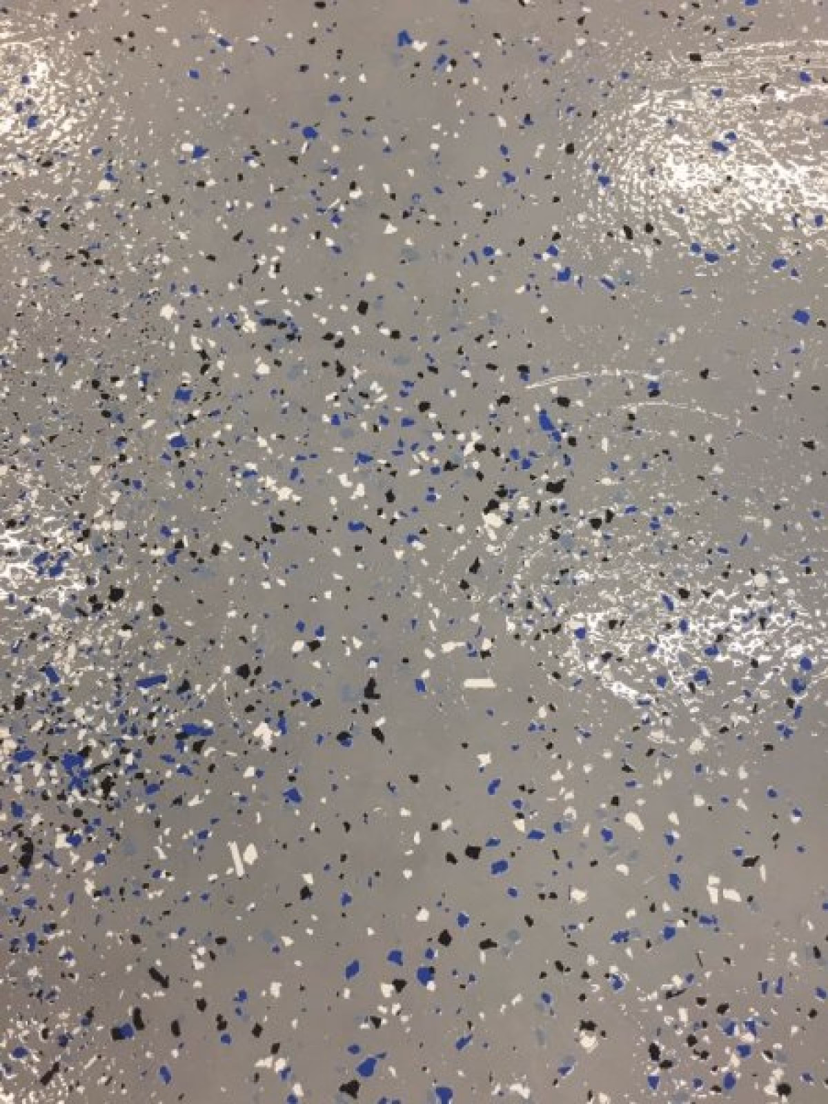 Hoe kan ik spikkels in de verf verwijderen?